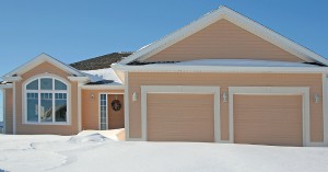 House with garage doors in winter