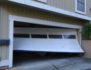 Garage door off its tracks