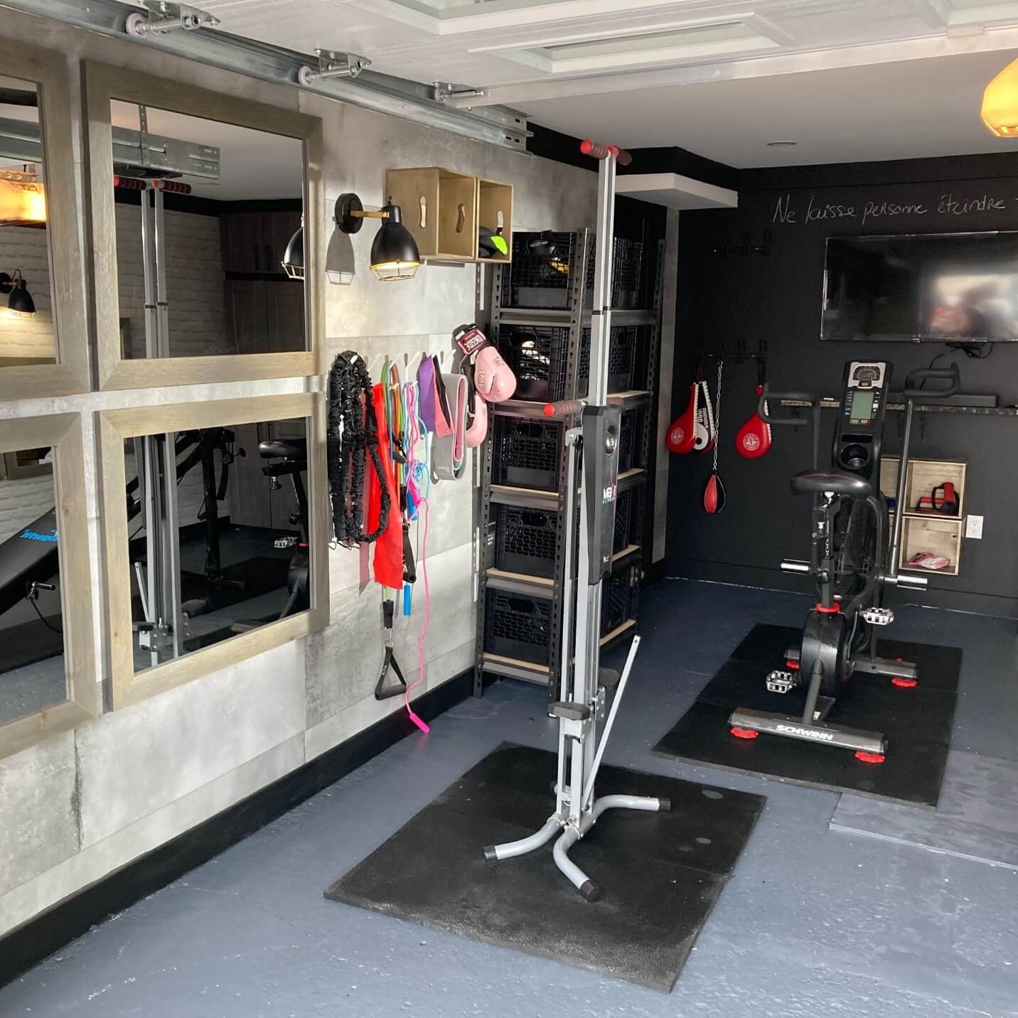 Gym in a garage - the old cracked concrete floor was repaired, painted and given a good coat of Expoxy. Mirrors, storage space. Everything is there!