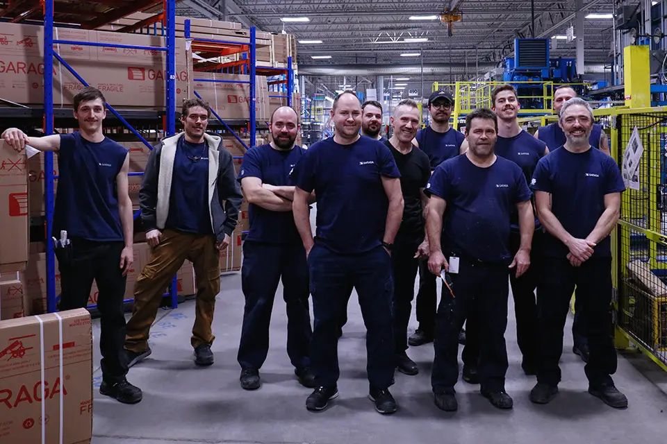 Garaga team building garage doors at the St-Georges manufacturing facility