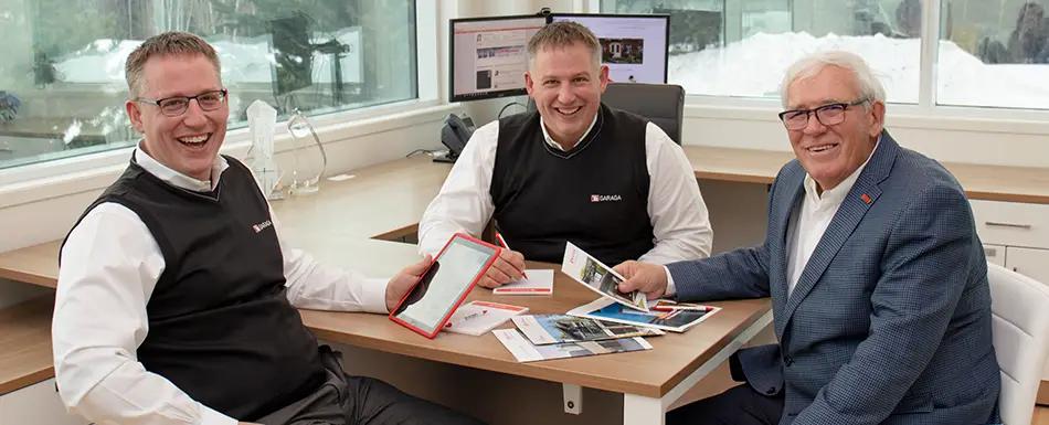 Garaga’s Founder and Chairman of the Board, Michel Gendreau, with his twin sons, Maxime and Martin Gendreau, co-presidents of Garaga since 2018.