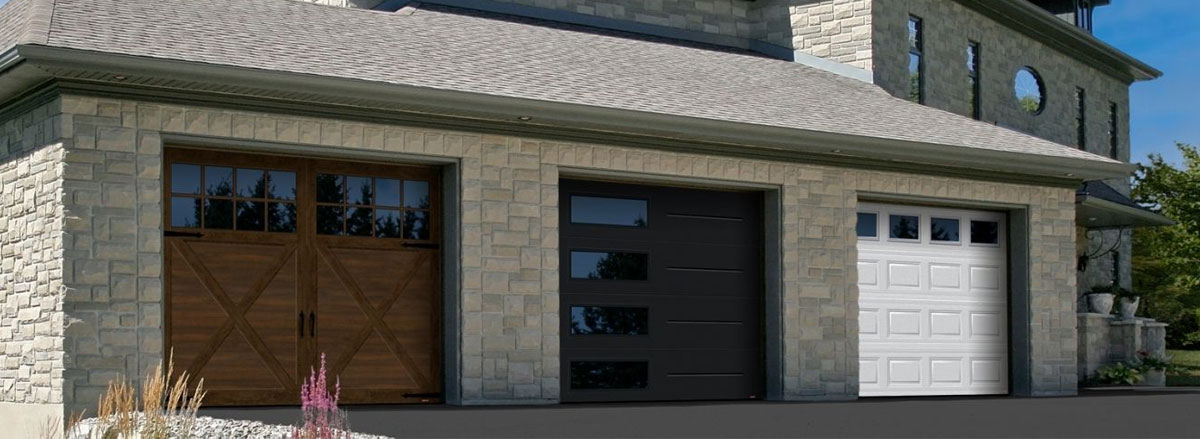 Sample house showing the 3 styles of garage doors: Carriage House, Contemporay and Traditional