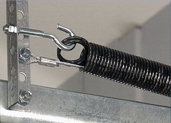 Extension spring with safety cable