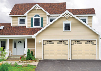 Garage door with double-pane sealed windows