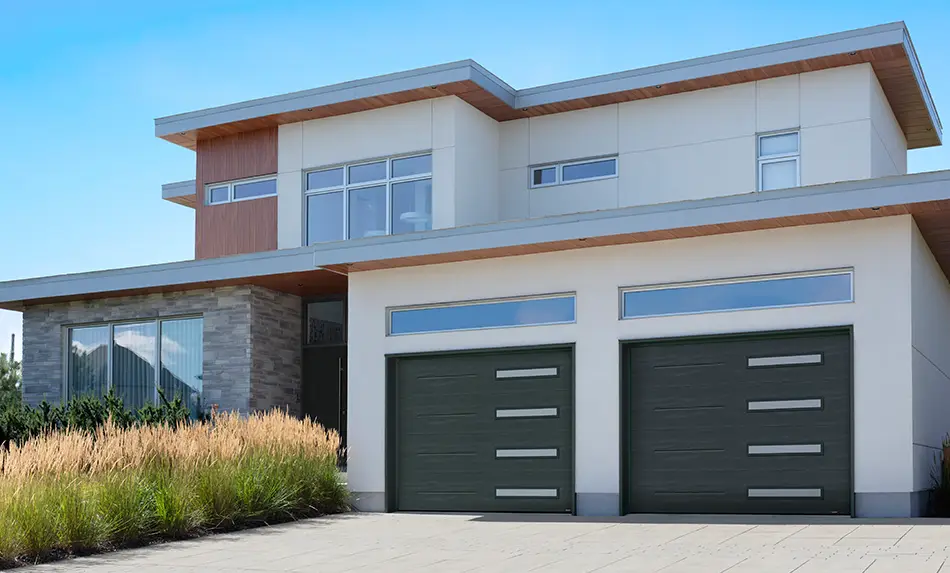 Garaga latest garage door styles with slim horizontal windows and Garaga door new Iron Ore colour perfect for Japandi exteriors.