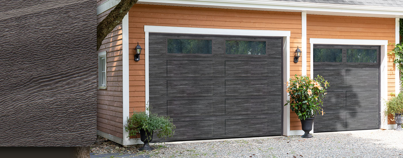 Detached double garage, orange vinyl, grey asphalt shingle roof, Weathered Grey, Faux Wood garage doors with windows