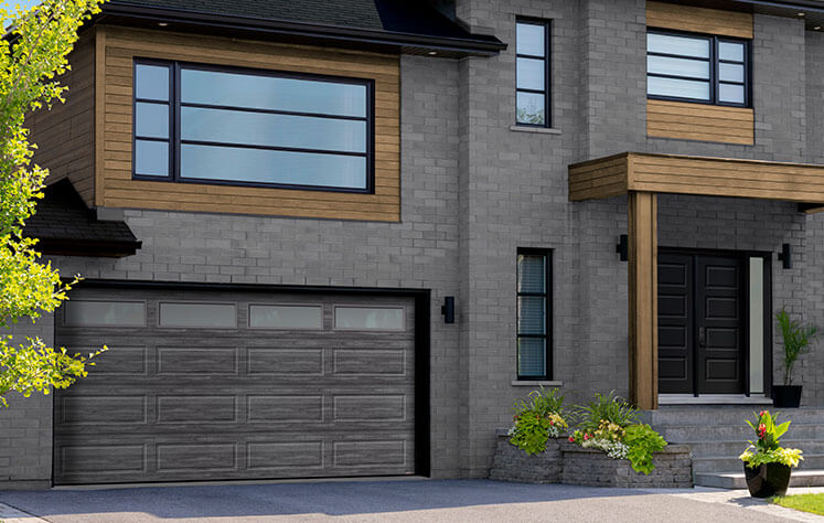 Garaga garage door: Model Standard+ Shaker-Modern XL, 16' x 8', Weathered Grey Faux Wood, Sandblasted windows / Novatech entry door: Model Soho from Shaker Collection