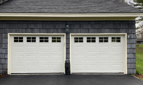 House with Classic CC garage doors, 9' x 6' 6'', Ice White, Orion 4 lite windows