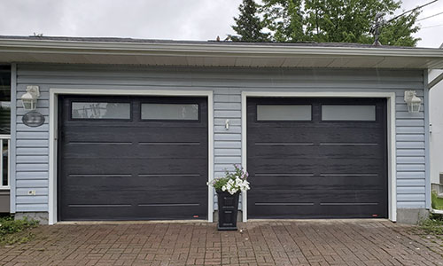 House with Vog garage doors, 8' 0” x 6' 9”, Black, sandblasted glass windows