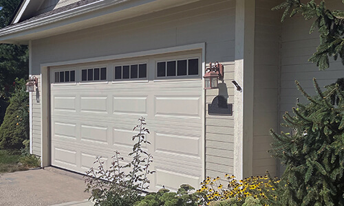 Acadia138 Classic XL garage door, 16' x 7', Desert Sand, windows with Richmond Inserts