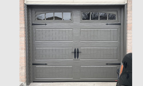 North Hatley LP garage door, Dark Sand, windows with Richmond Arch Long Inserts