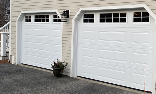 House with Classic MIX garage door, 9' x 7', Ice White, Orion 4 vertical lite and 8 lite windows