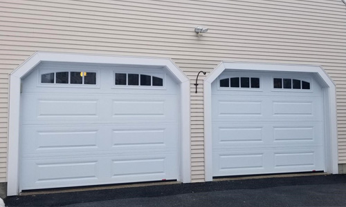 House with Classic XL garage door, 9' x 7', Ice White  windows with Richmond Arch Long Inserts