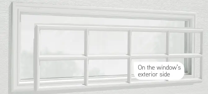 Close-up of a decorative insert installed on the exterior of the window.