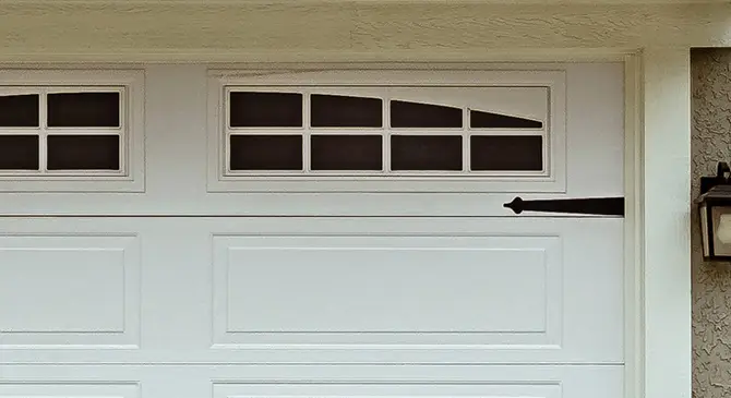 Zoomed garage door with decorative inserts