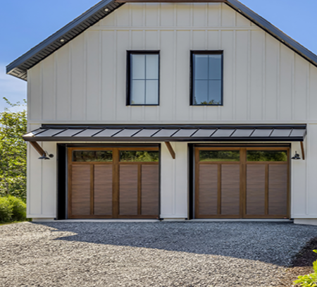 Single Carriage House Style garage door with the Eastman E-21 design in the Claystone door colour with Ice White overlays