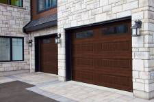 You like this look? This garage door is a Standard+ Classic XL, 9' x 7', American Walnut, Clear windows.