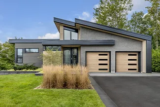 Flush, 9’ x 7'.6, Natural Oak HD Wood Tone doors, window layout: Right-side Harmony, Slim windows with Tinted glass. Novatech's Uno entry door.