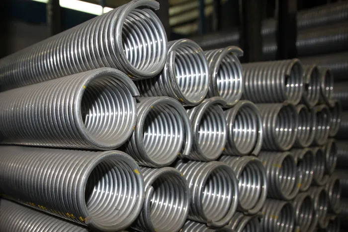 New torsion springs in stock, ready for installation by the Doormasters repair service in Red Deer.