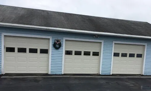 Acadia 138 garage doors Classic CC, 8' x 7', Desert Sand, Clear windows