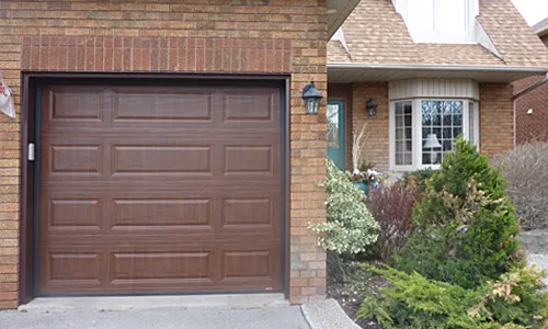 Brick brown house with Classic MIX garage door, 8' x 7', American Walnut colour,  Faux Wood
